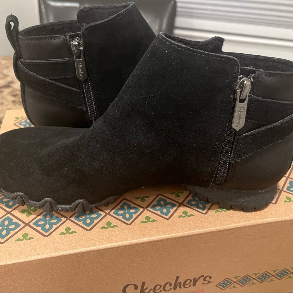 Skechers black suede booties
Like new 
Memory foam - Picture 3 of 3